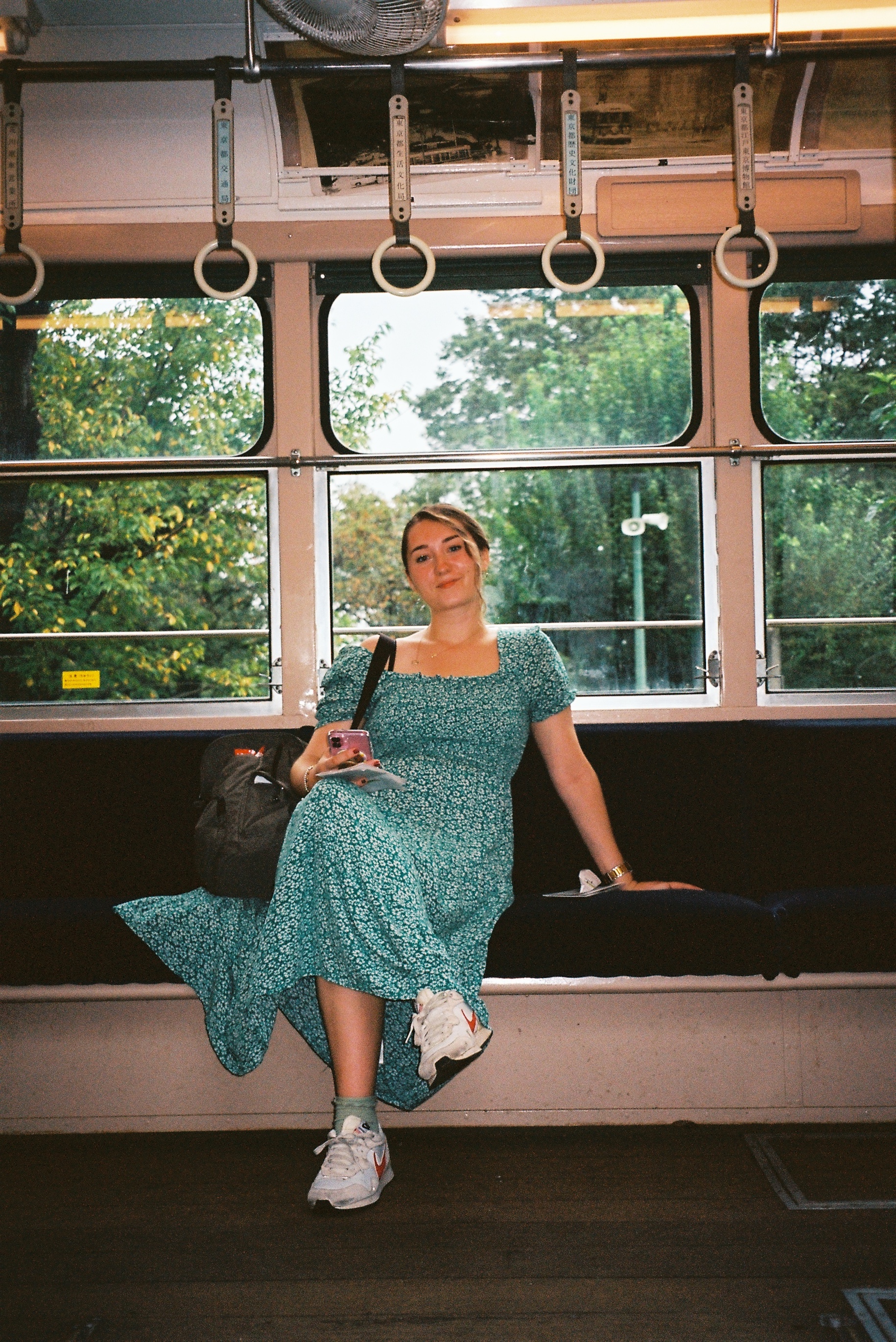 Bea Hebron sitting on a bus